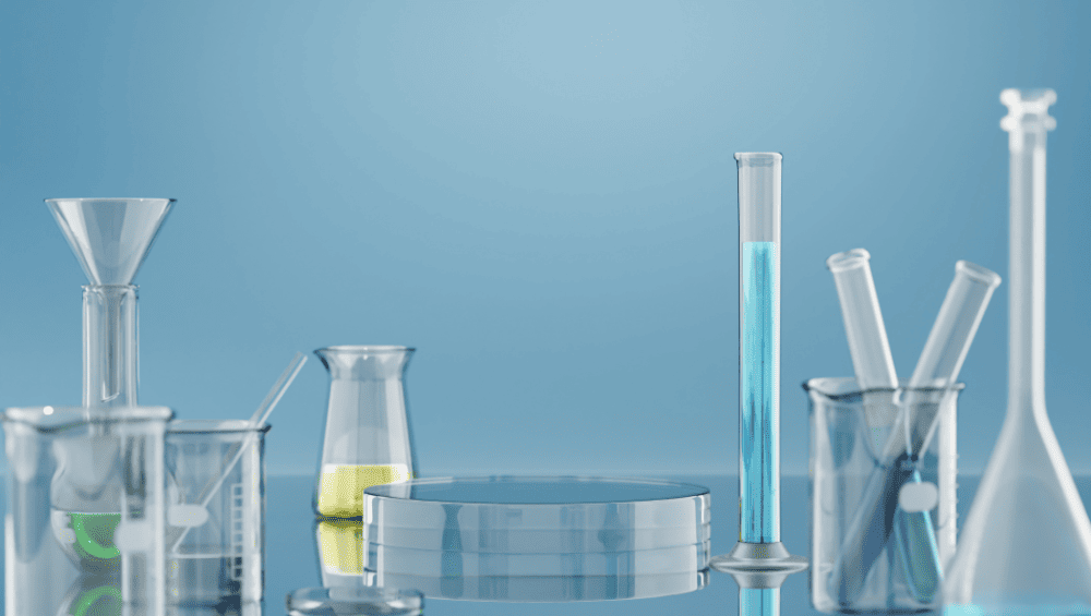 Nutralfit Clareador Funciona? Fórmula concentrada, imagem com tubos de ensaio, demonstrando o processo de criação do produto.
